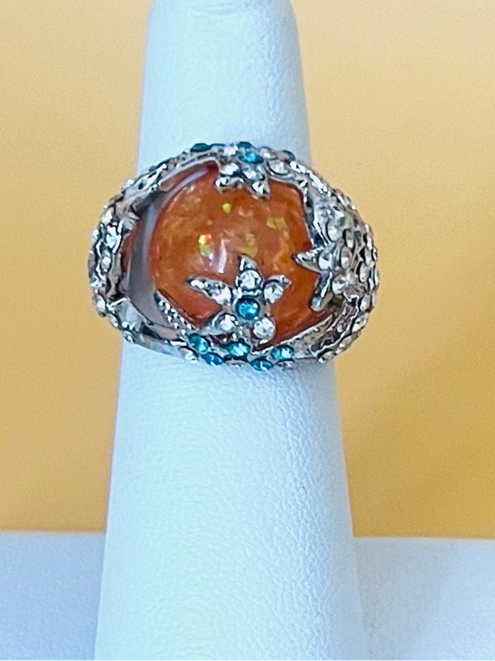 Stainless steel paved clear CZ dome ring size 6, large round orange faux opal